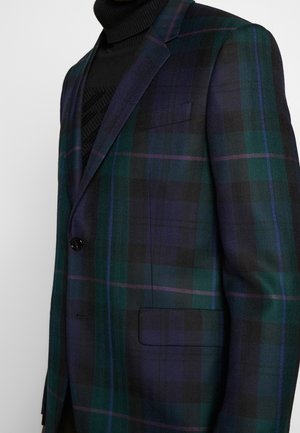 Blazer de cuadros en colores verde oscuro, negro y púrpura. Fabricado con una tela suave, cuenta con un cierre de un solo botón y un bolsillo frontal.