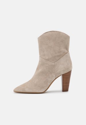 Botines camperos - beige