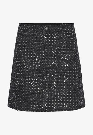 Μαύρη φούστα με δομημένο σχέδιο, σε ύφασμα με υφή διακοσμημένο με μεταλλικές πούλιες που δημιουργούν ένα λαμπερό εφέ.