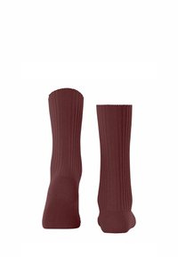 Calze ribbed borgogna con una texture morbida e un design a metà polpaccio, con aree del dito e del tallone rinforzate per una maggiore durata.