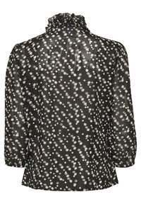 Black blouse with a ruffled collar, featuring a star-like white and pink floral pattern. Made from lightweight, sheer fabric. Long sleeves.