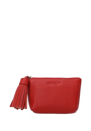 Red leather pouch with a textured surface, featuring a zipper closure and a decorative tassel on the side. Logo embossed on the front.