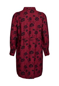 Red dress with black floral and polka dot pattern, long sleeves, collar, cinched waist, and button closure at the wrist.