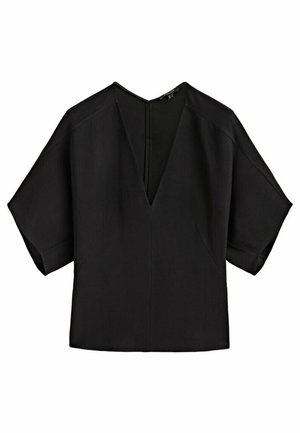 Blouse noire à manches courtes avec un profond col en V et une coupe ample, en tissu lisse, présentée à plat sur fond blanc.