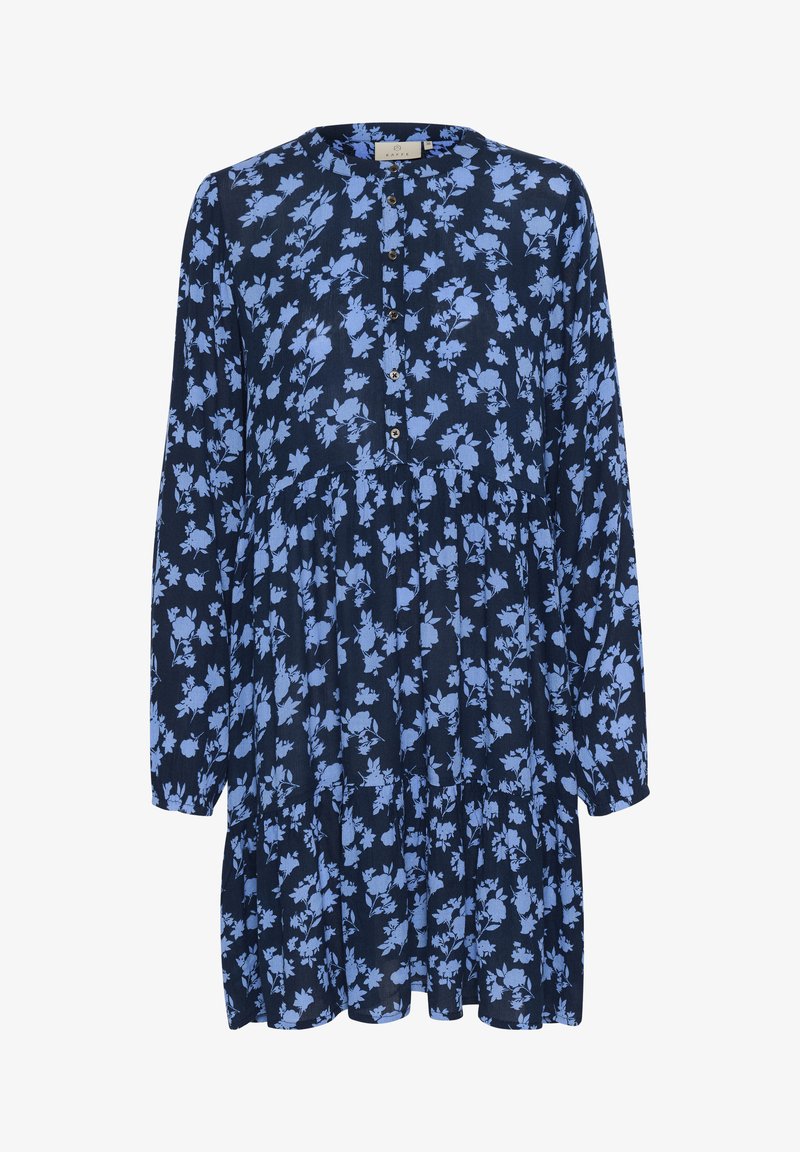 Marineblå blomsterkjole med lange ærmer, rund halsudskæring, knapfront og tiered skørt, med lyseblå bladmønstre.