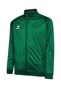 Zielona sportowa kurtka z zamkiem, wykonana z gładkiego, błyszczącego materiału. Posiada stójkę, boczne kieszenie oraz detal z logo na piersi.