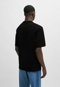 HUGO NILEY - T-shirt - bas - black one