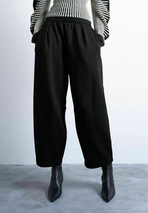MIT WEITEM BEINSCHNITT TSJANICE JOGGIN - Træningsbukser - black