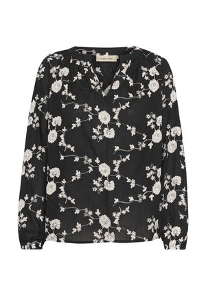 Blusa nera con scollatura a V e maniche lunghe, decorata con ricami floreali bianchi su tutta la superficie. Leggera con una finitura leggermente strutturata.