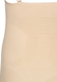 Beige formande bodysuit med ribbat mönster och slät finish, med justerbara remmar och en sömlös design för en strömlinjeformad look.