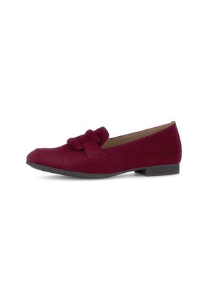 Burgundy suede flat shoe with a rounded toe, featuring a decorative knot accent and a low, black rubber heel. Smooth texture overall.