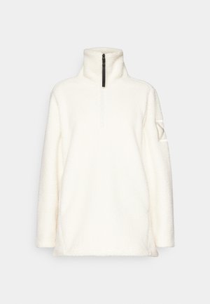 Weißer Fleece-Pullover mit hohem Kragen, halb geschlitztem Frontreißverschluss, langen Ärmeln und einem einzigartigen gemusterten Akzent am linken Ärmel.