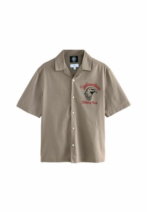 Korte mouw, beige overhemd van katoen met knopen, voorzien van rode geborduurde tekst "Yellowstone National Park" en een ontwerp van een adelaar.