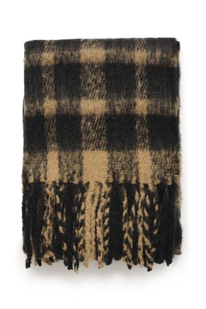 Fekete és bézs kockás mintájú gyapjúszőnyeg, rojtos széllel és puha, texturált felülettel. Mérete 150 cm x 130 cm.