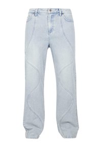 Jeans de mezclilla azul claro con patrones de costura curvados, cierre de botón y un ajuste relajado. La tela tiene una textura suave con un ligero desvanecimiento.