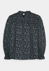 Blusa preta com pequeno estampado floral azul e branco, corpete franzido e detalhe de abertura nas costas. Mangas longas com punhos em babados.