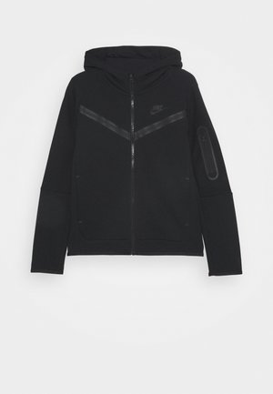 Sort Nike hættetrøje med lynlås med chevron-detalje på brystet, lynlåslomme på venstre ærme og lange ærmer.