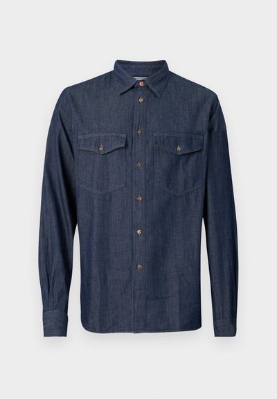 Mørk denim skjorte med lange ermer, knapper-down krage, to brystlommer og kontrasterende brune knapper. Glatt tekstur og vanlig passform.