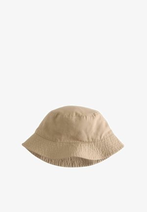 Beige cotton bucket hat with stitched seams and a downward-sloping wide brim, isolated on white background.