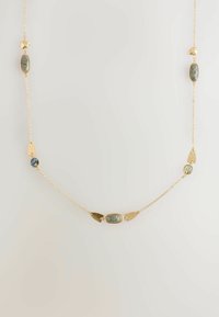 Gold chain necklace featuring oval and triangular stone accents in shades of green and blue, with varying textures and a delicate design.