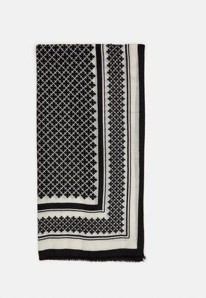Schwarz-weißer Schal mit geometrischem Muster und Sternen, umrandet von kontrastierenden Streifen. Hergestellt aus weichem Stoff mit fransigen Kanten.