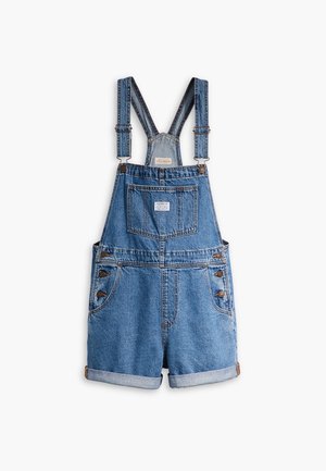 Blå denim korte overalls med justerbare stropper, brystlomme foran, knapper i siden, opkrogede kanter og forlommer i siden.