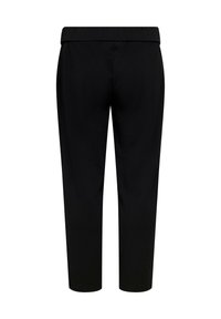 Pantalones negros con cintura elástica, silueta entallada y textura suave. Presentan costuras sutiles y no tienen bolsillos visibles.