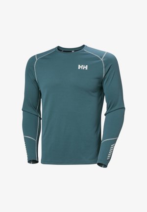 Blaues Langarm-Performance-Shirt aus strukturiertem Stoff. Verfügt über reflektierende Akzente und ein Logo auf der Brust. Enganliegendes Design.