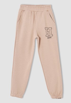 Beige Jogginghose mit elastischem Bund und Bündchen, Seitentaschen sowie einem schwarzen, umrandeten "H" mit dem Schriftzug "Harry Potter" am oberen linken Bein.