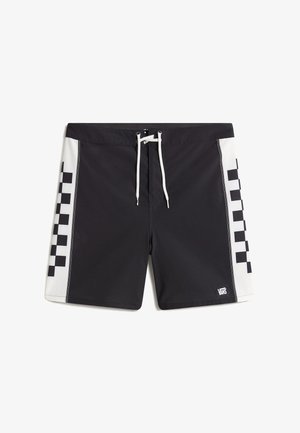 Shorts de bain noirs avec un panneau latéral blanc présentant un motif à damier, fermeture à cordon et logo Vans sur le bas à droite.