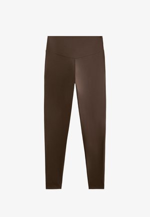 Leggings marron en matière extensible, avec une taille haute et une texture lisse et uniforme sur l'ensemble. Sans motifs ni accents.