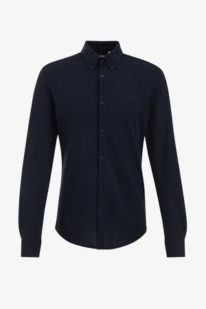 Tengerészkék hosszú ujjú, gombos ing galléros nyakkal, elülső gombsorral és kis logóval a mellrészen. Puha anyag, sima textúrával.