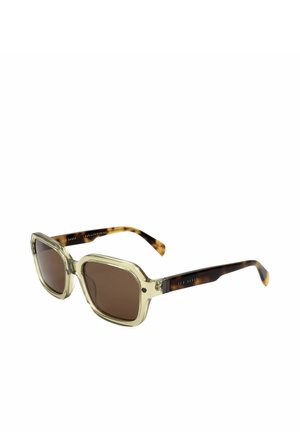 Occhiali da sole quadrati con montatura beige trasparente chiara e lenti marrone scuro, con aste con motivo tartaruga.