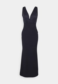 Mörkblå aftonklänning med spetsliv och djup V-ringning, åtsittande form som övergår i en utsvängd kjol. Slät tygtextur.