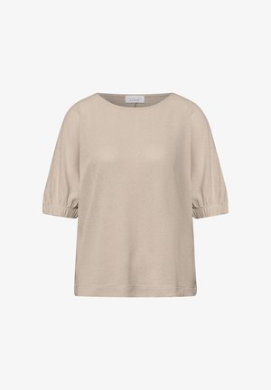 Haut beige à manches courtes avec encolure ronde et poignets élastiques froncés, en tissu texturé.