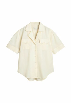 Krátký rukáv, krémová košile, design s knoflíkovým zapínáním, dvě náprsní kapsy, široký límec a zaoblený spodní lem, vyrobená z lehkého materiálu.
