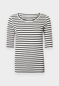 T-shirt à rayures noires et blanches avec un col rond et des manches trois-quarts. Tissu en coton doux avec une coupe ajustée.