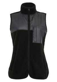 Chaleco de forro polar negro con cremalleras en el frontal, cuello alto y un panel negro brillante en el pecho con un bolsillo. Incluye dos bolsillos laterales.