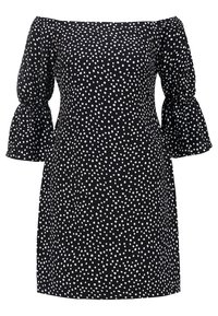 Svart axelbandslös klänning med vita prickar, som har puffärmar och rak fåll. Tillverkad av lättviktsmaterial.