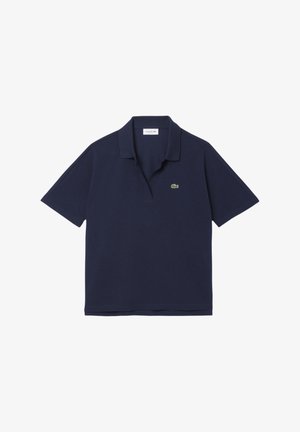 Marinblå polotröja i bomull, med kort krage, korta ärmar och en liten grön broderad krockodil-logotyp på bröstet.