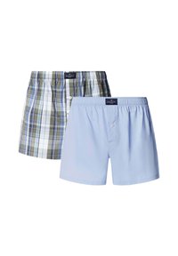 Deux paires de boxers pour hommes : l'une avec un motif à carreaux verts et bleus, l'autre en bleu clair uni. Les deux ont une ceinture élastique et des boutons.
