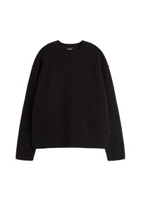 Pull noir en matière douce, présentant un col rond, des poignets et un ourlet côtelés. Le design comprend des manches raglan et une coupe décontractée.