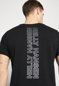 Helly Hansen CORE GRAPHIC - Triko s potiskem - black