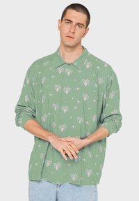 Kaotiko UNISEX CLEOPATRA - Blúzka so zapínaním na gombíky - pink