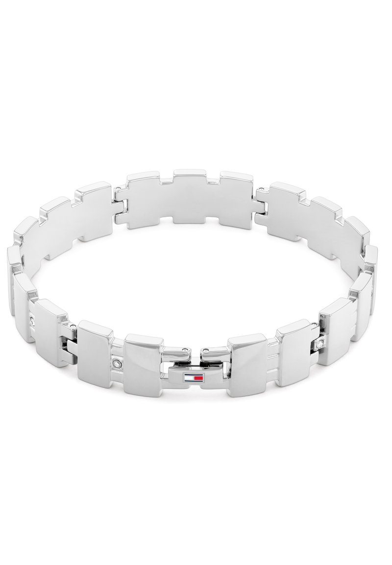 Silver stainless steel bracelet featuring a flat-link design with polished surfaces and connected segments, including a logo accent.