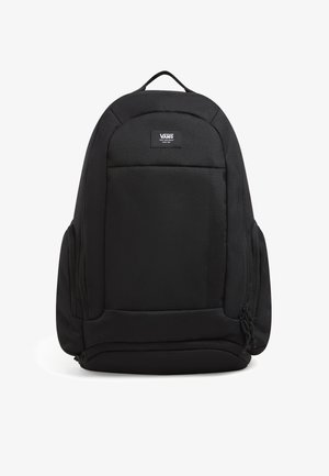 Black backpack made of durable fabric, featuring a padded back, multiple zippered compartments, and a label on the front pocket.
