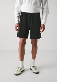 Abercrombie & Fitch JOCK TAG RELAXED - Shorts - black beauty acid wash