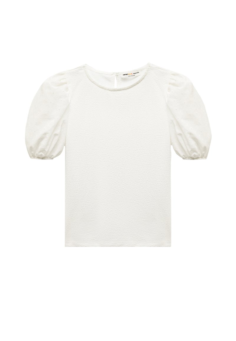 Hvid tekstureret top med puffærmer. Har en rund halsudskæring og en nøglehulslukke bagpå. Stoffet virker let og luftigt.