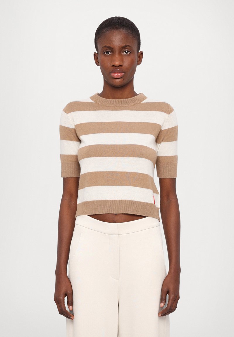 Khaki and cream striped knit sweater with a round neckline and short sleeves, slightly cropped fit, featuring a small red accent at the hem.