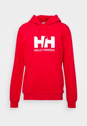 Rode pullover hoodie met een voorste kangoeroezak. Kenmerkt een wit "HH" logo en de tekst "HELLY HANSEN" gedrukt op de borst, met een capuchon met trekkoord.